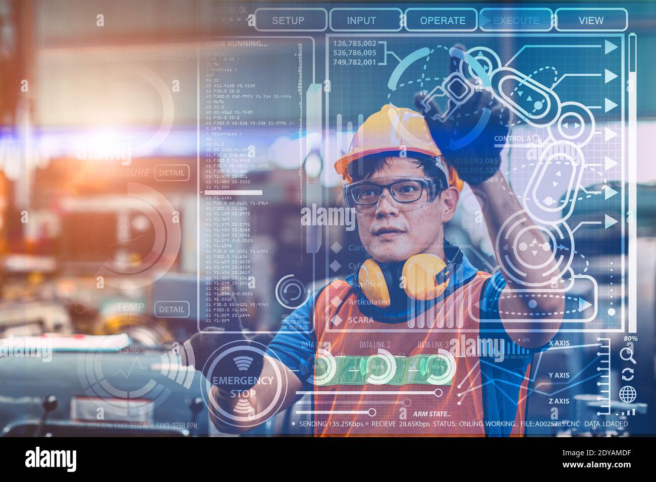 Smart engineer worker using advance technology visual holographic air screen to program and control robotic arm for automated production in modern fut Stock Photo