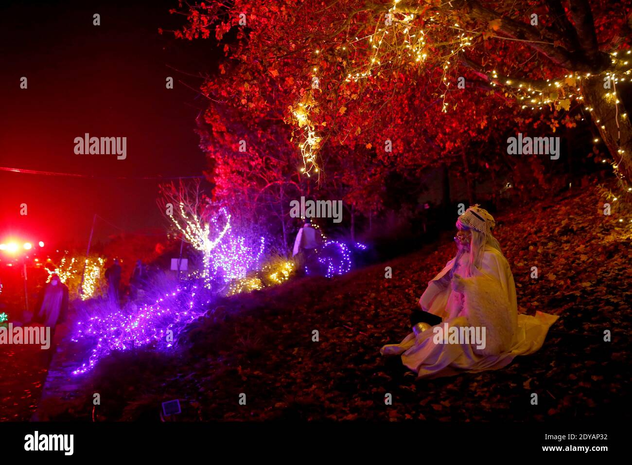 Jerusalem. 24th Dec, 2020. A woman poses for photos while visiting the