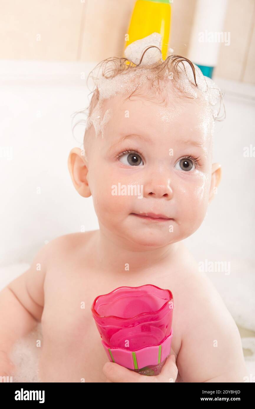 Girl Playing With Toys In Bathtub Stock Photo Alamy