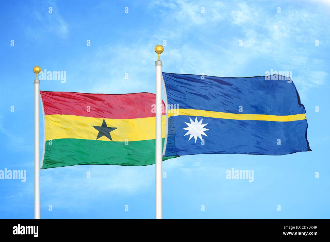 Ghana and Nauru two flags on flagpoles and blue sky Stock Photo