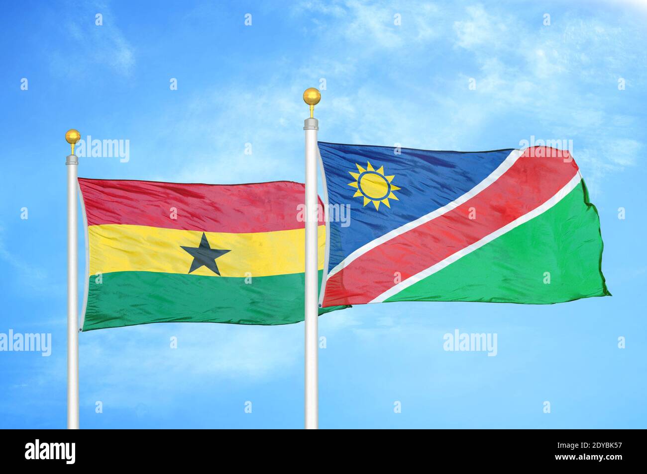 Ghana and Namibia two flags on flagpoles and blue sky Stock Photo