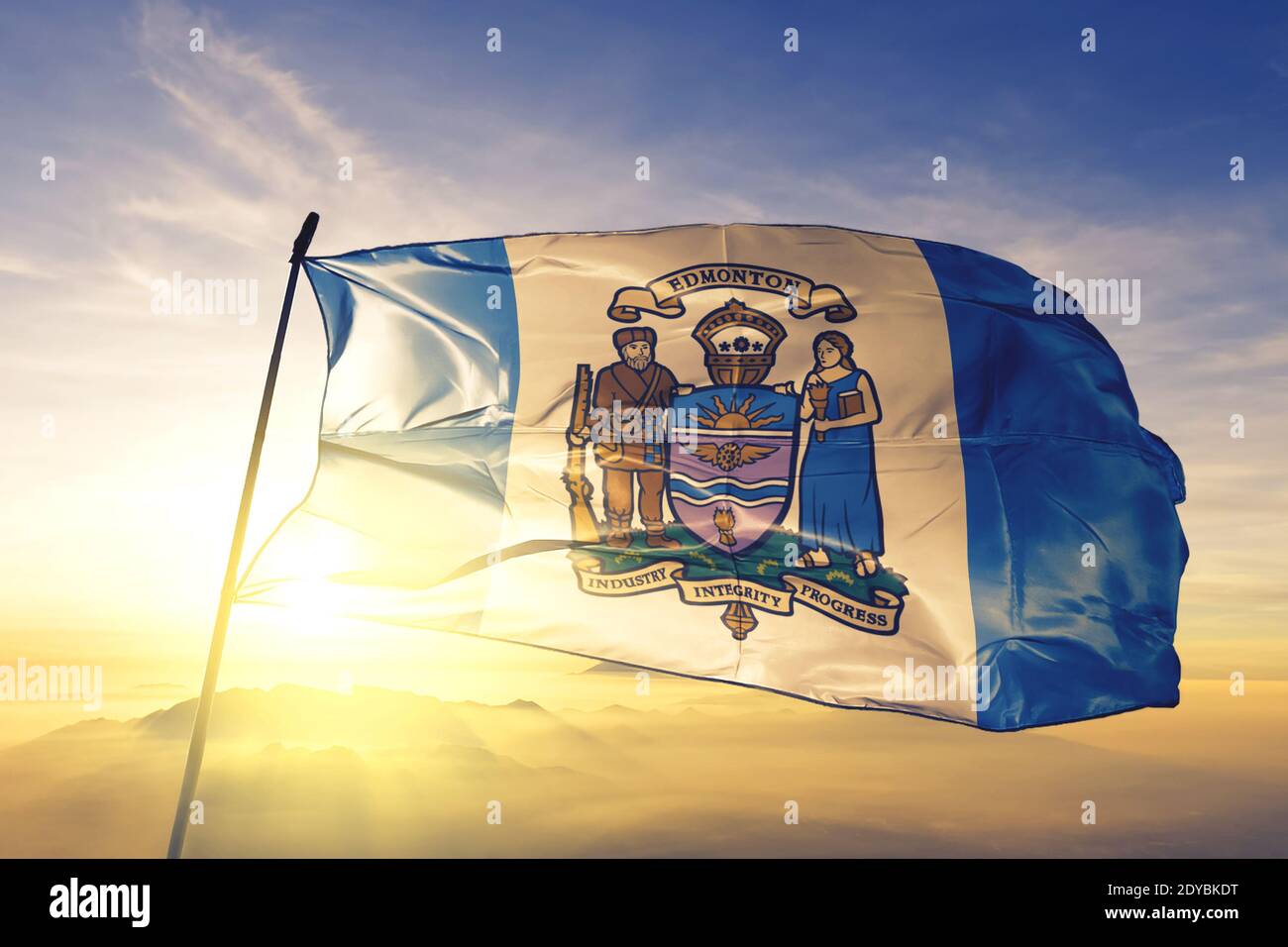 Edmonton of Alberta of Canada flag waving on the top sunrise mist fog