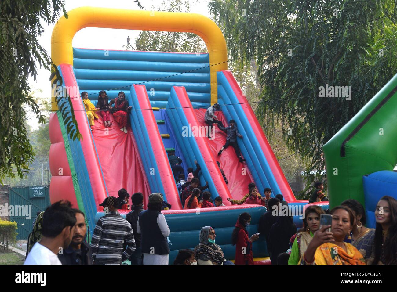 Pakistani large number of Christen people are enjoying at Lahore Zoo after Christmas prayers during the celebrations of Christmas in  Lahore Stock Photo