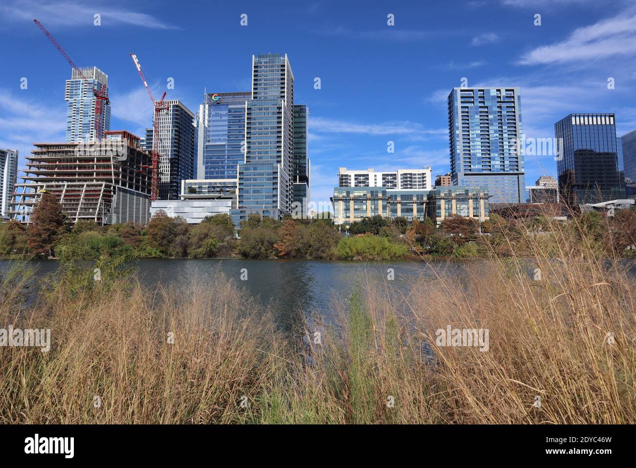 A beautiful view across the Colorado River to the skyline of downtown Austin, Texas Stock Photo