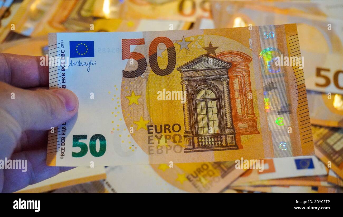 Big paper money pile of 50 euro bills or banknotes. Lots of money or  currency. Money and finance. Concept of being or getting rich Stock Photo -  Alamy