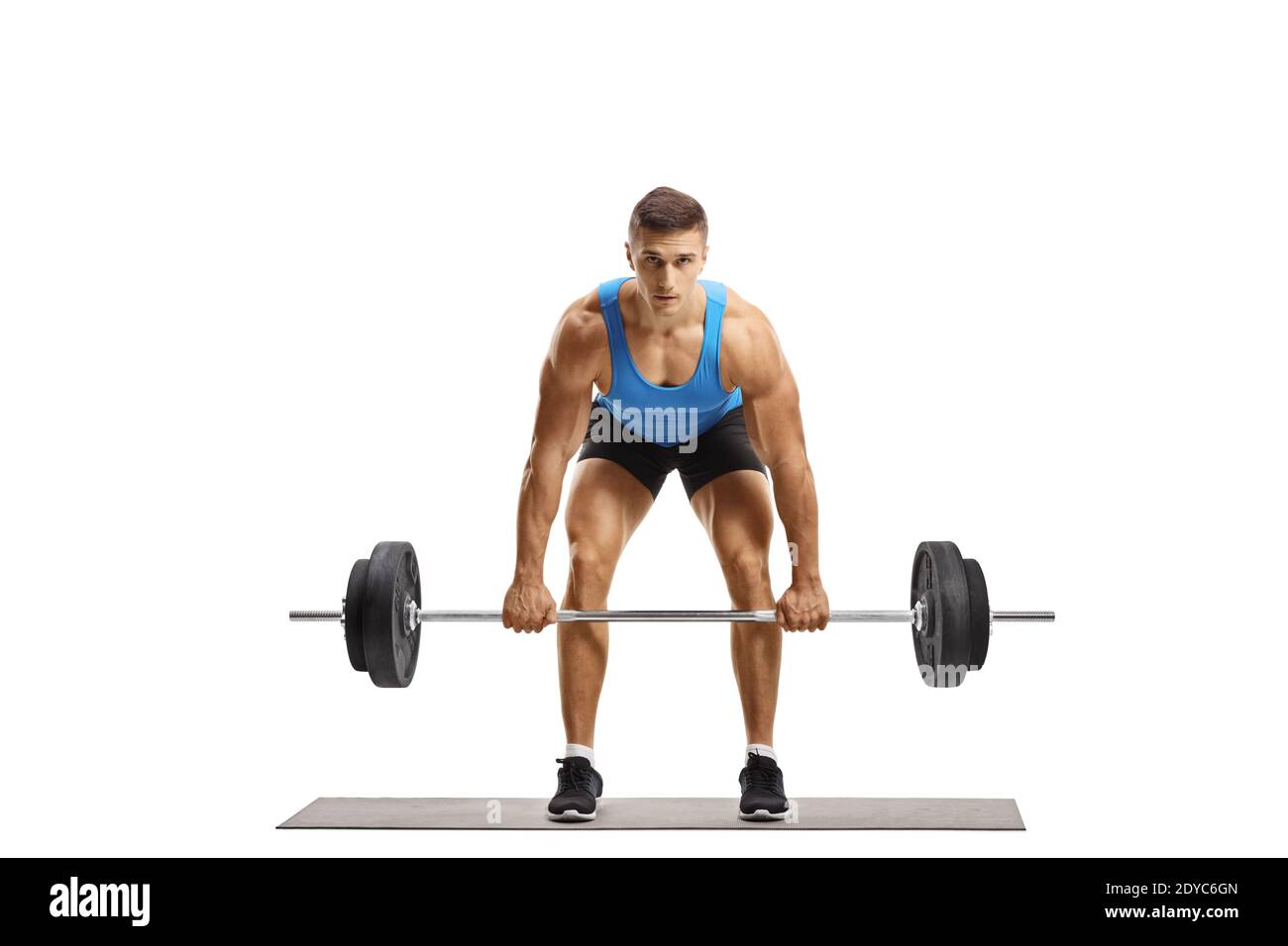 Strong guy lifting heavy weights and looking at camera isolated on white background Stock Photo