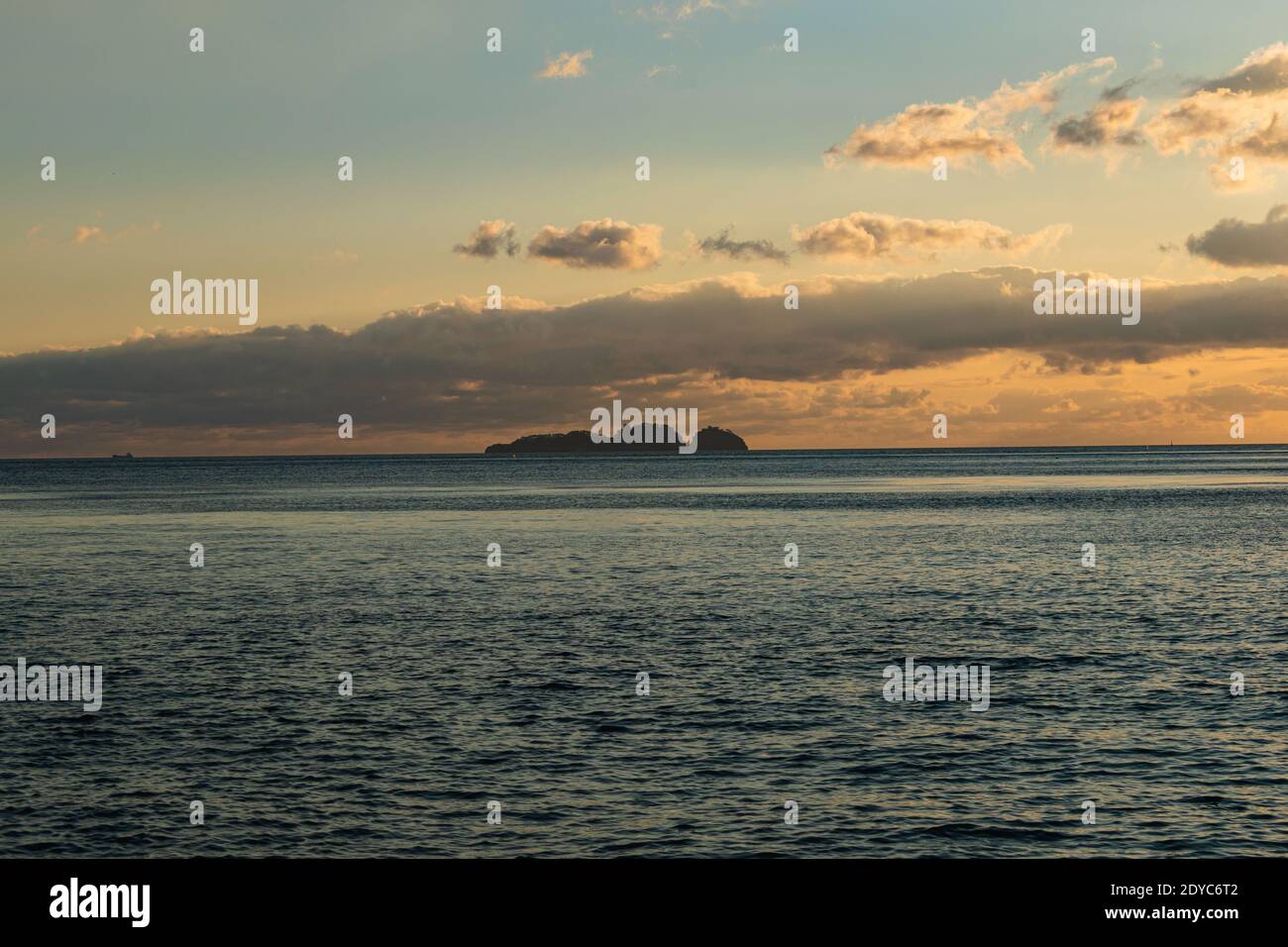 A beautiful scenery of the sunset sky over the sea Stock Photo - Alamy