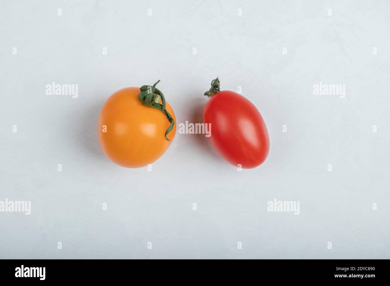 Fresh organic red and yellow tomatoes Stock Photo - Alamy