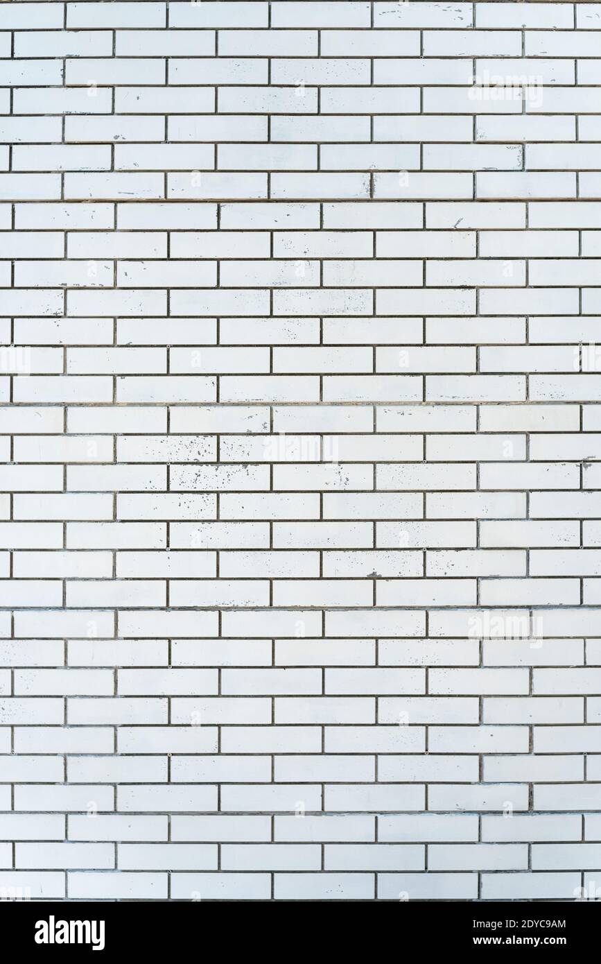 Brickwork. Wall of white silicate brick. Abstract background. Vertical frame Stock Photo
