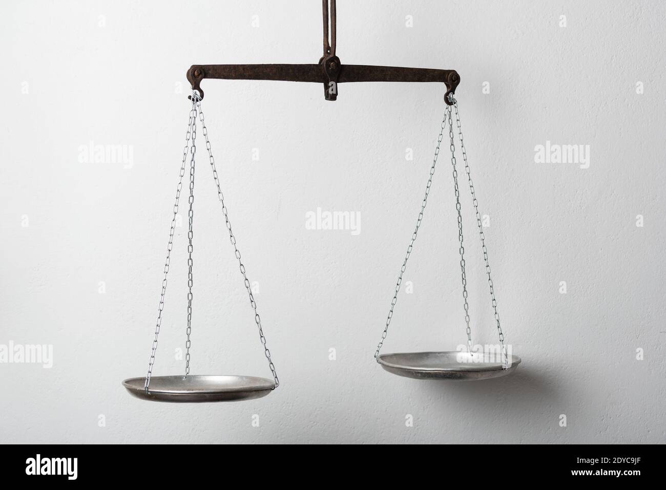 Silver balance scale or beam balance on white background. Laboratory scales  Stock Photo - Alamy