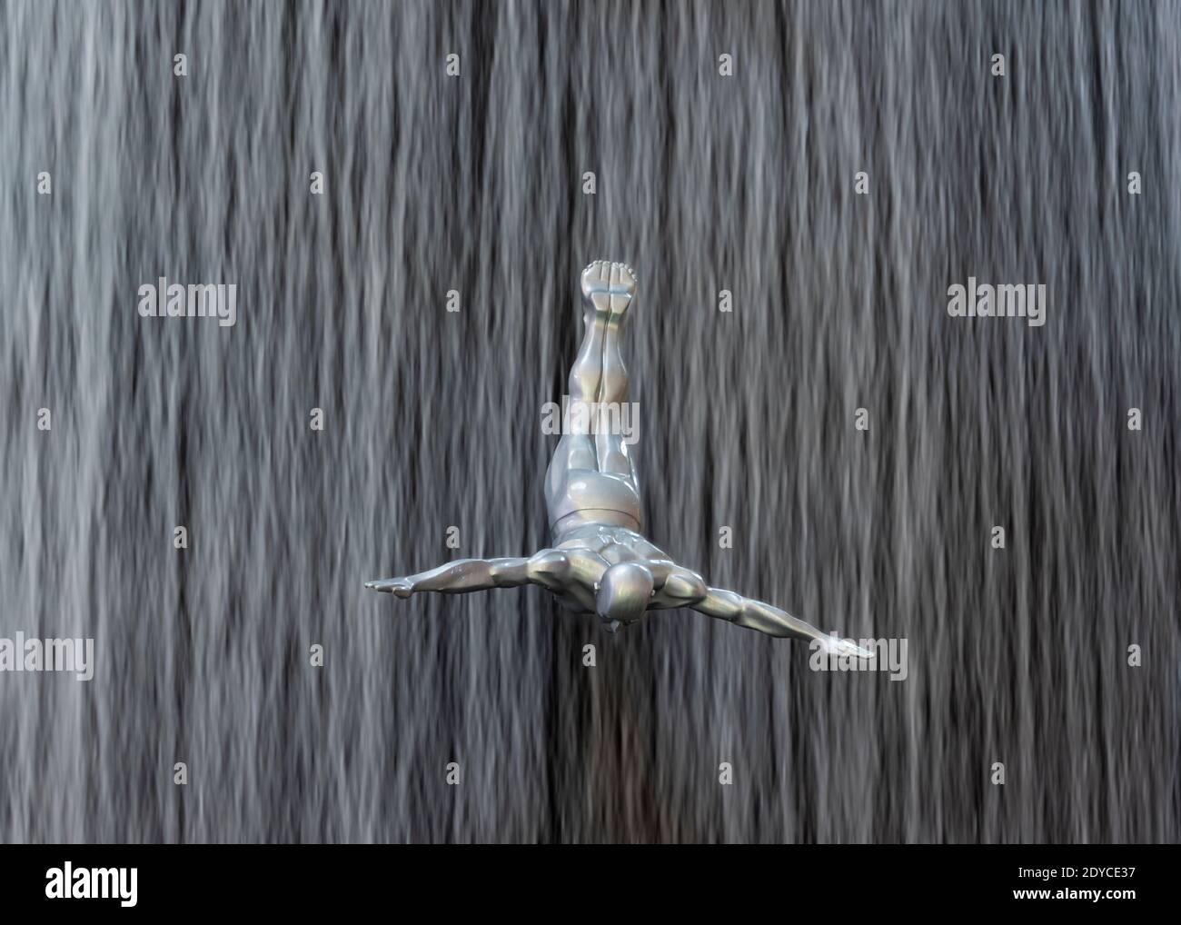 Human waterfall, male diver, Dubai Shopping Center, Dubai, UAE Stock Photo