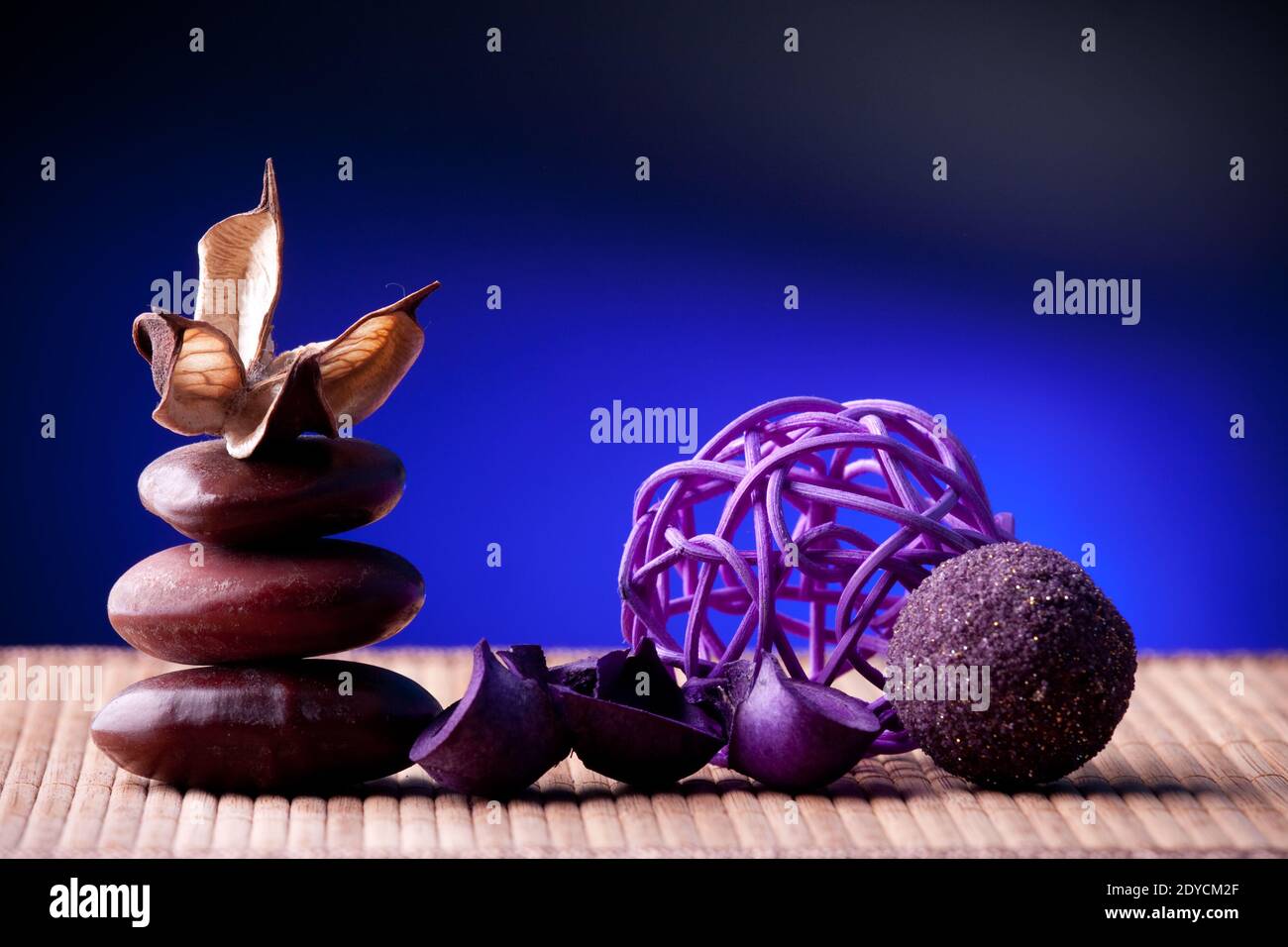 Purple Potpourri arranged zen style Stock Photo Alamy