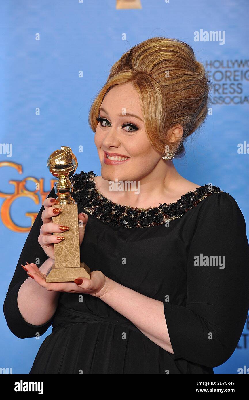 Adele with the award for best song for the theme tune to the last James Bond blockbuster movie Skyfall poses in the press room at the 70th Annual Golden Globe Awards Ceremony, held at the Beverly Hilton Hotel in Los Angeles, CA, USA on January 13, 2013. Photo by Lionel Hahn/ABACAPRESS.COM Stock Photo