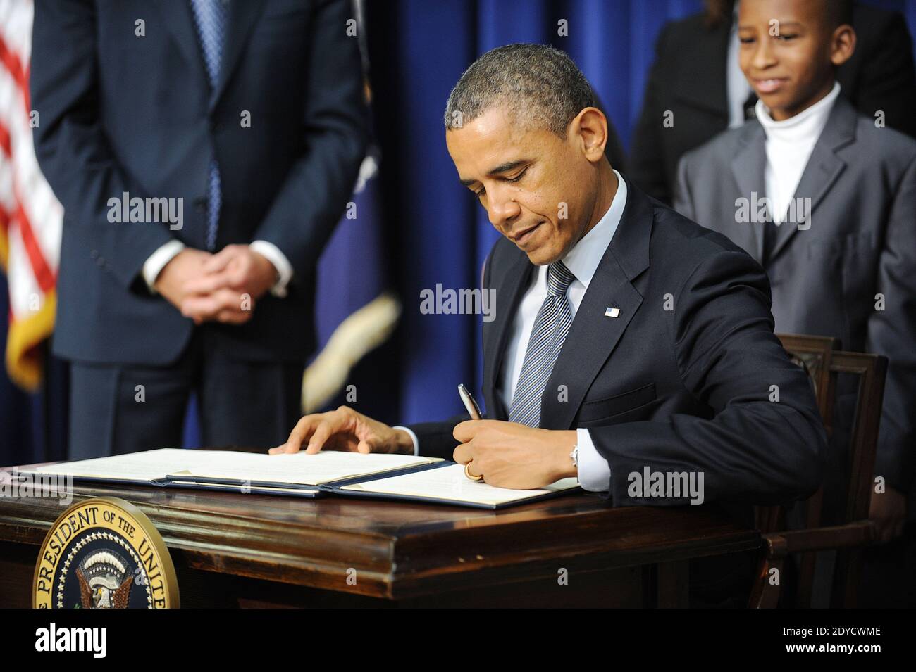 U.S. President Barack Obama signs a series of executive orders about the administration's new gun law proposals in the Eisenhower Executive Office building January 16, 2013 in Washington, DC, USA. Photo by Olivier Douliery/ABACAPRESS.COM Stock Photo
