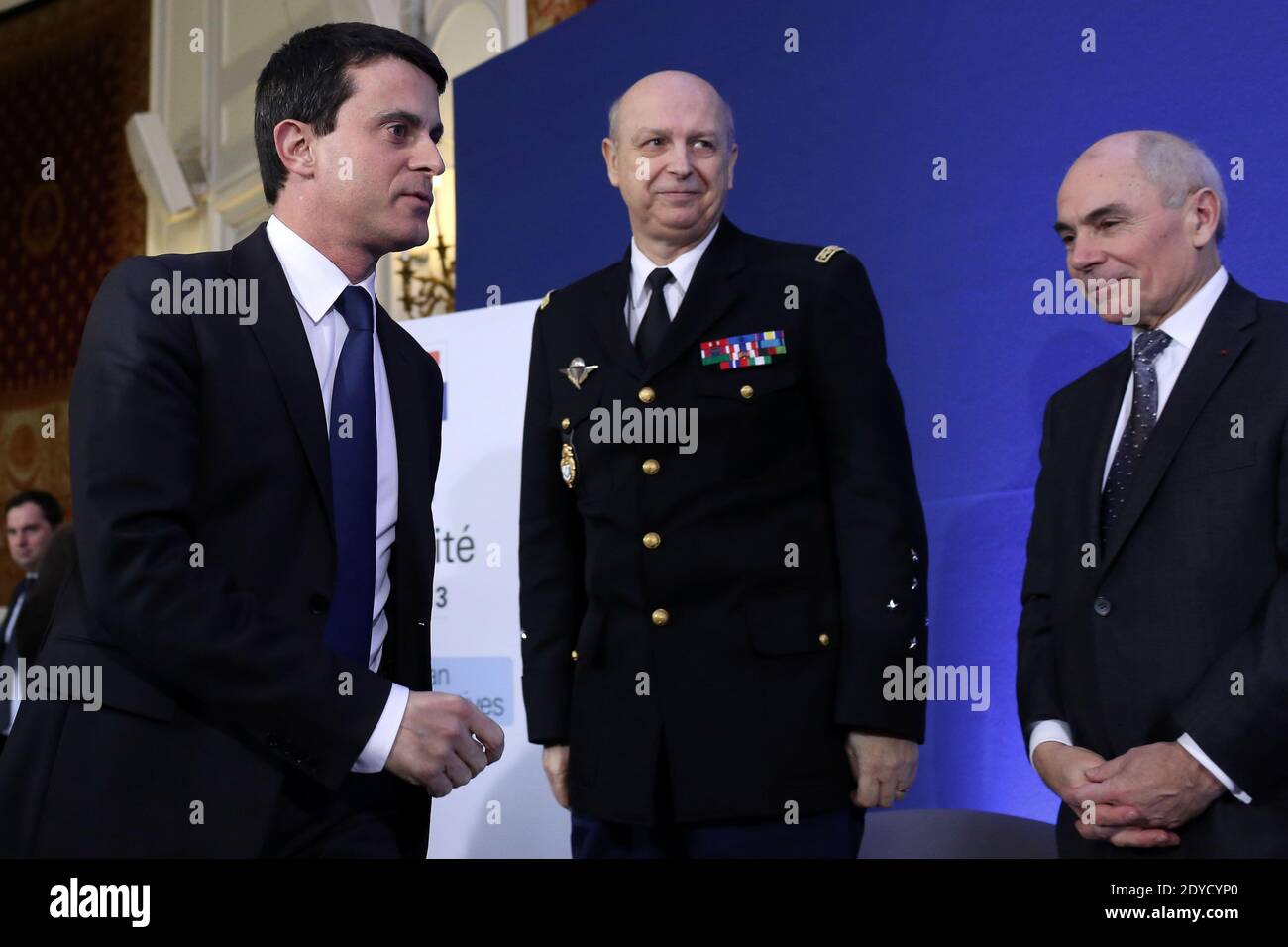 French Interior minister, Manuel Valls arrives next to Jacques Mignaux, general director of the gendarmerie nationale and Thierry Lataste, chief of staff of French Interior minister to present the report of the past year and the prospects of the security policy for the upcoming year, in Paris, France on January 18, 2013 Photo by Stephane Lemouton/ABACAPRESS.COM. Stock Photo