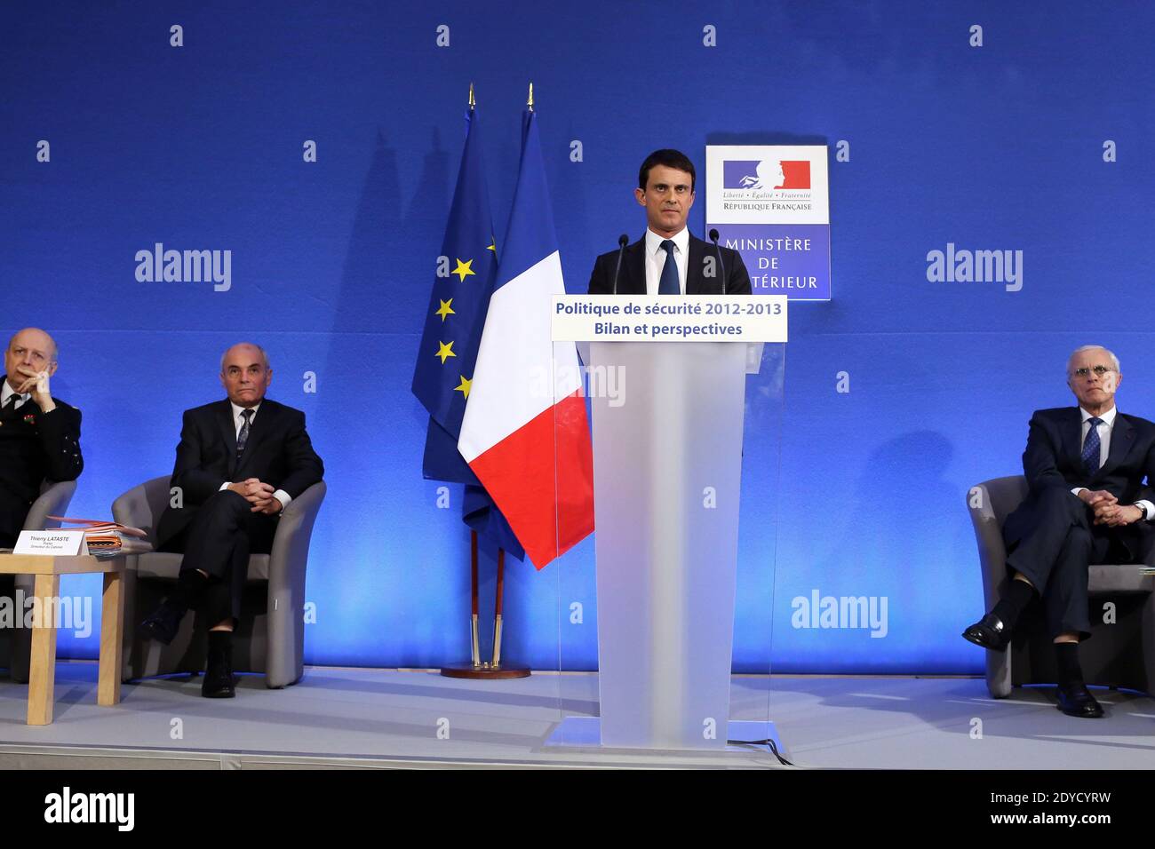 French Interior minister Manuel Valls flanked by Jacques Mignaux general director of the gendarmerie nationale, Thierry Lataste, chief of staff of French Interior minister and Bernard Boucault, Paris police prefect delivers a speech at the ministry in Paris, to present his report of the past year and the prospects of the security policy for the upcoming year, in Paris, France on January 18, 2013 Photo by Stephane Lemouton/ABACAPRESS.COM. Stock Photo