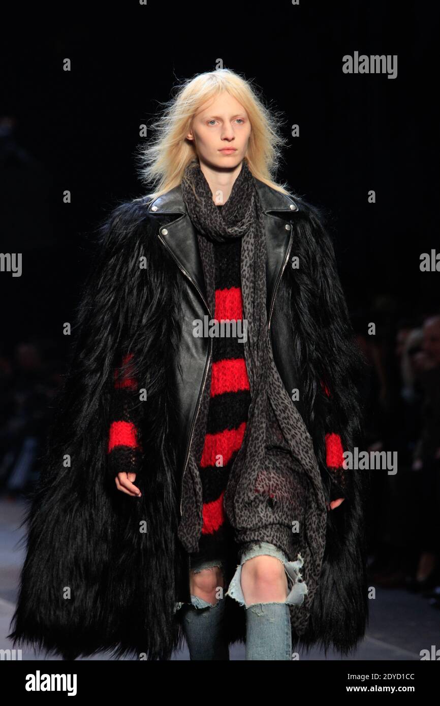 A model displays a creation by Hedi Slimane for Yves Saint Laurent