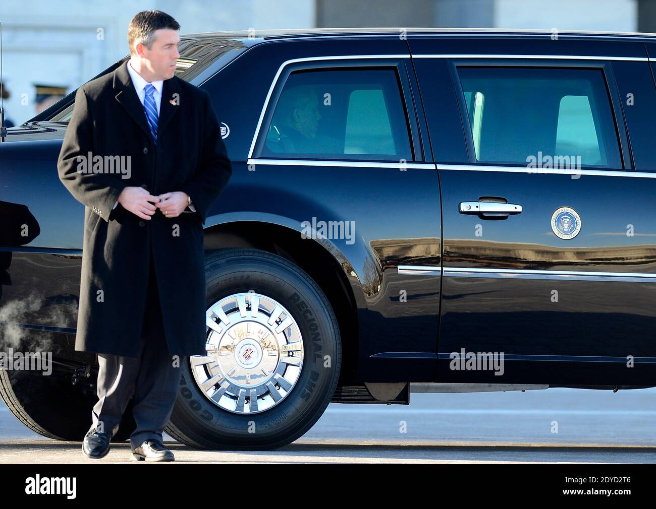 US President Barack Obama waits seated in his limousine for the start of the Inaugural Parade following the Presidential review of the troops on the east side of the United States Capitol following Obama's Inaugural address and ceremonially swearing in for a second term as the 44th President of the United States in Washington on January 21, 2013. Obama defeated Republican candidate Mitt Romney on Election Day 06 November 2012 to be re-elected for a second term. Photo by CJ Gunther/Pool/ABACAPRESS.COM Stock Photo