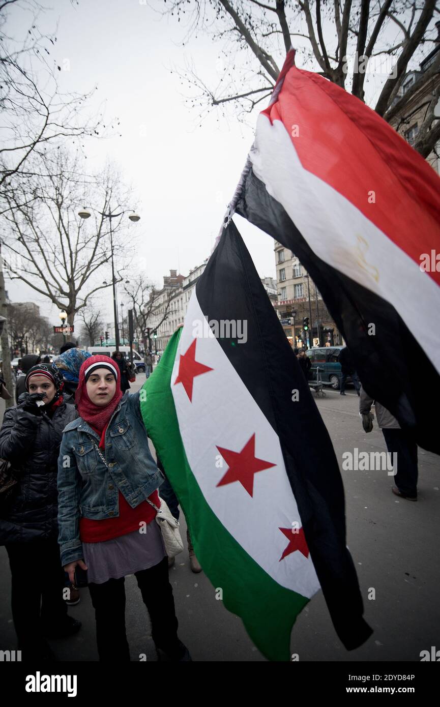 Dozens gather on the Boulevard de Belleville in Paris, France, Friday January 25, 2013, to show their support for the Egyptian people against the grip of radical Islamists in the corridors of power and the legal authority given to the army. Amnesty Internationnal and some supporters of the Syrian revolution took part. Photo by Nicolas Messyasz/ABACAPRESS.COM Stock Photo