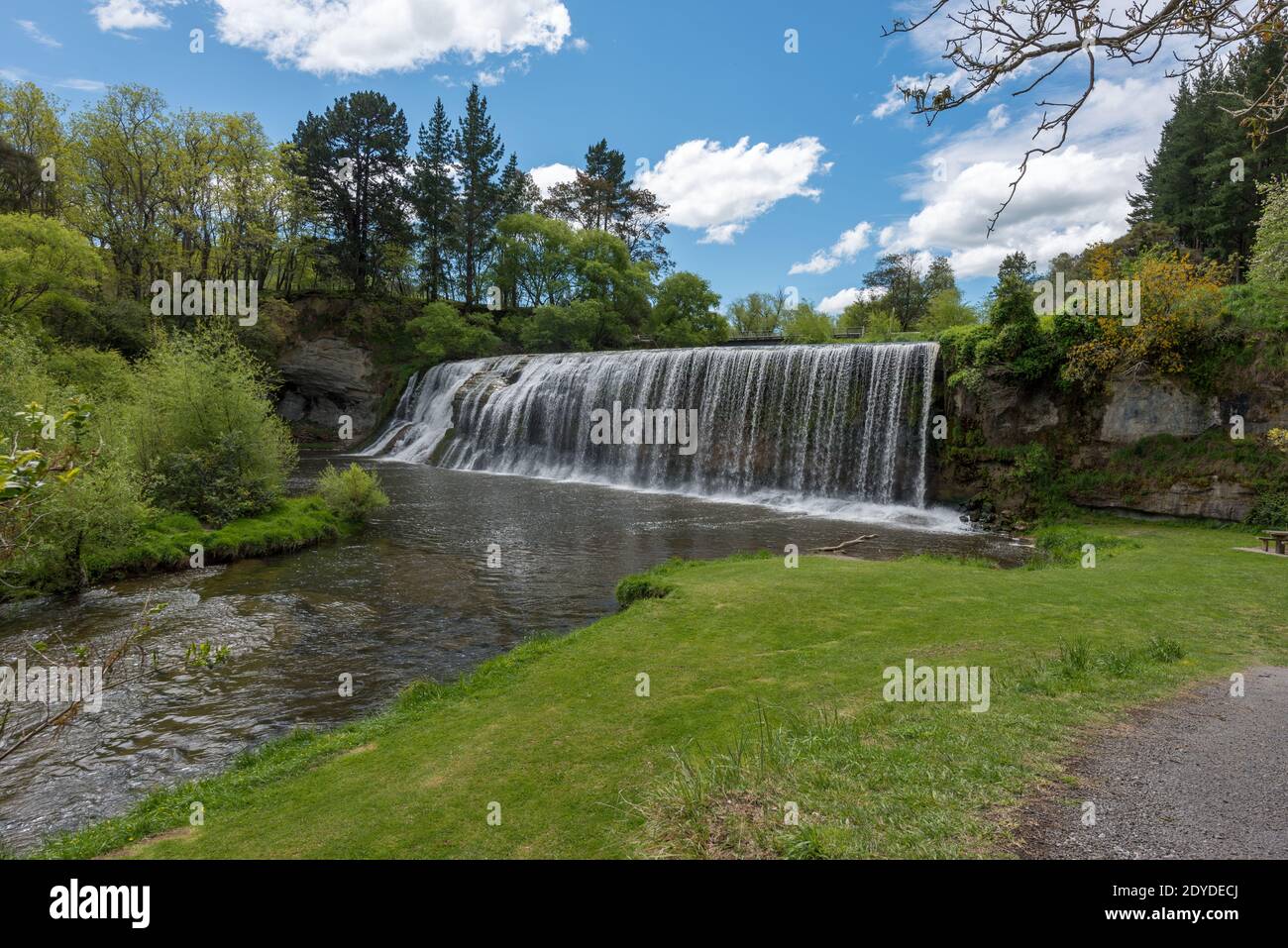 Rere waterfalls under blue skies in New Zealand Stock Photo