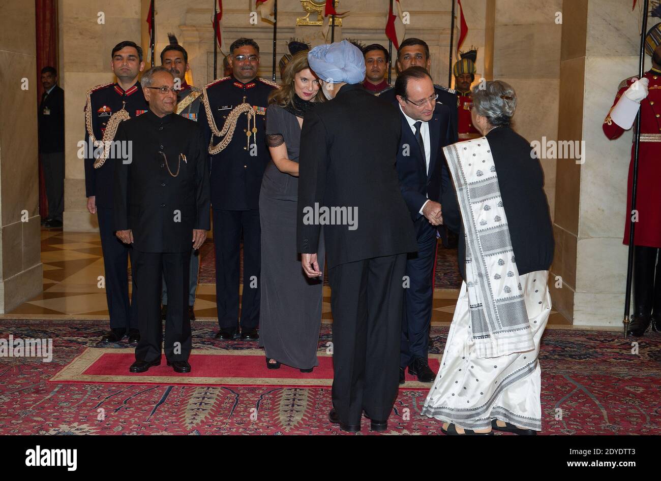 Indian President Pranab Mukherjee, Indian Prime Minister Manmohan Singh and his wife, French President Francois Hollande with his partner Valerie Trierweiler attend the State Dinner at the Rashtrapati Bhavan, Presidential palace in New Delhi, India on February 14, 2013. Photo by David Niviere/Pool/ABACAPRESS.COM Stock Photo