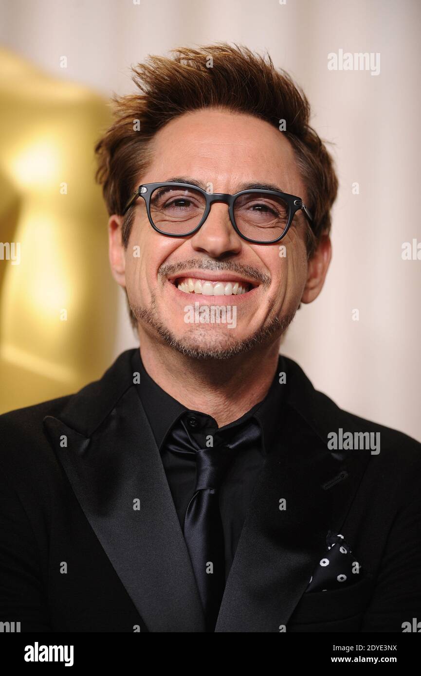 Robert Downey Jr. poses in the press room during the 85th Annual