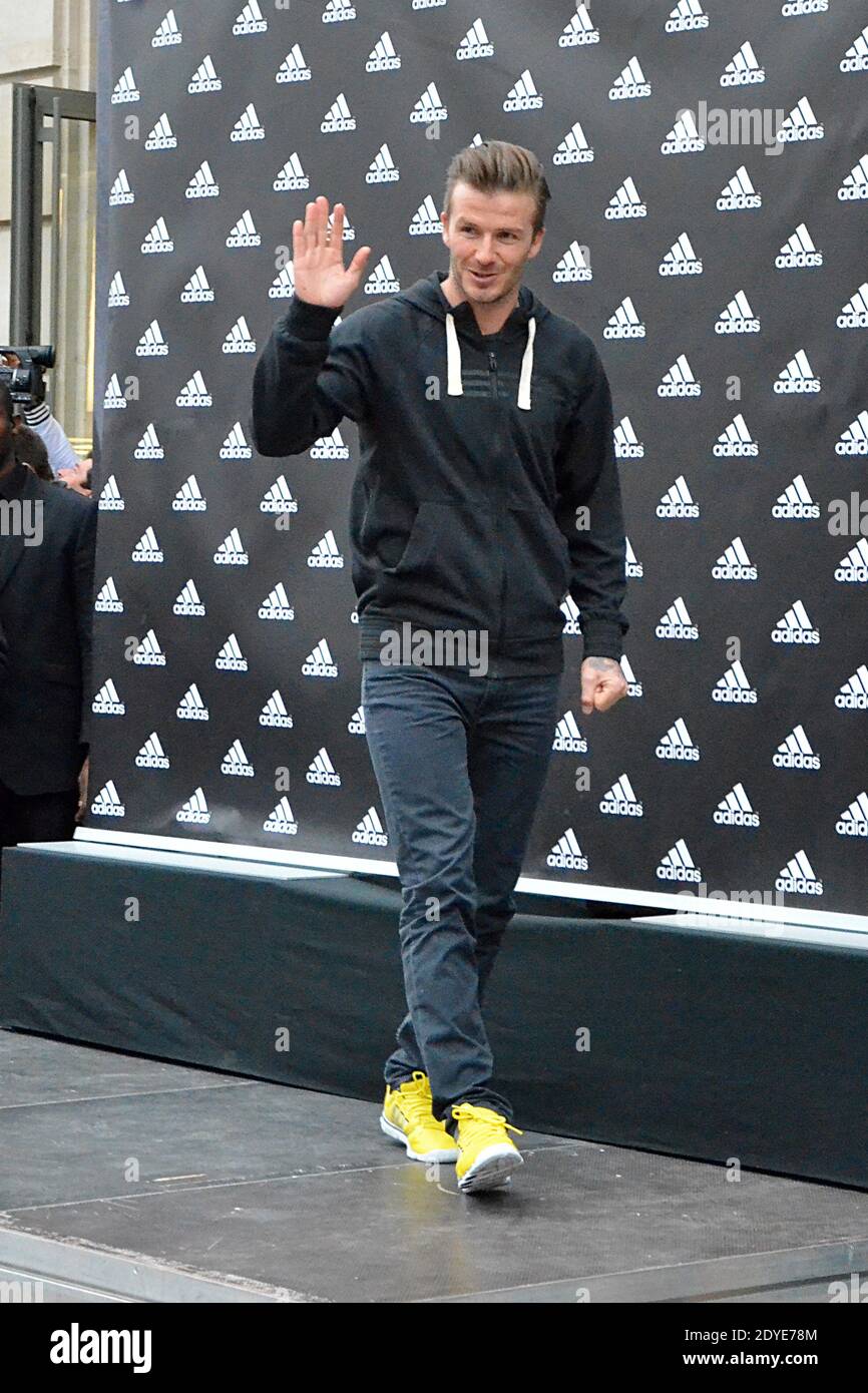 PSG's David Beckham signs autographs for his fans and supporters at Adidas  store, Champs Elysees Avenue in Paris, France on February 28, 2013. Photo  by Thierry Plessis/ABACAPRESS.COM Stock Photo - Alamy
