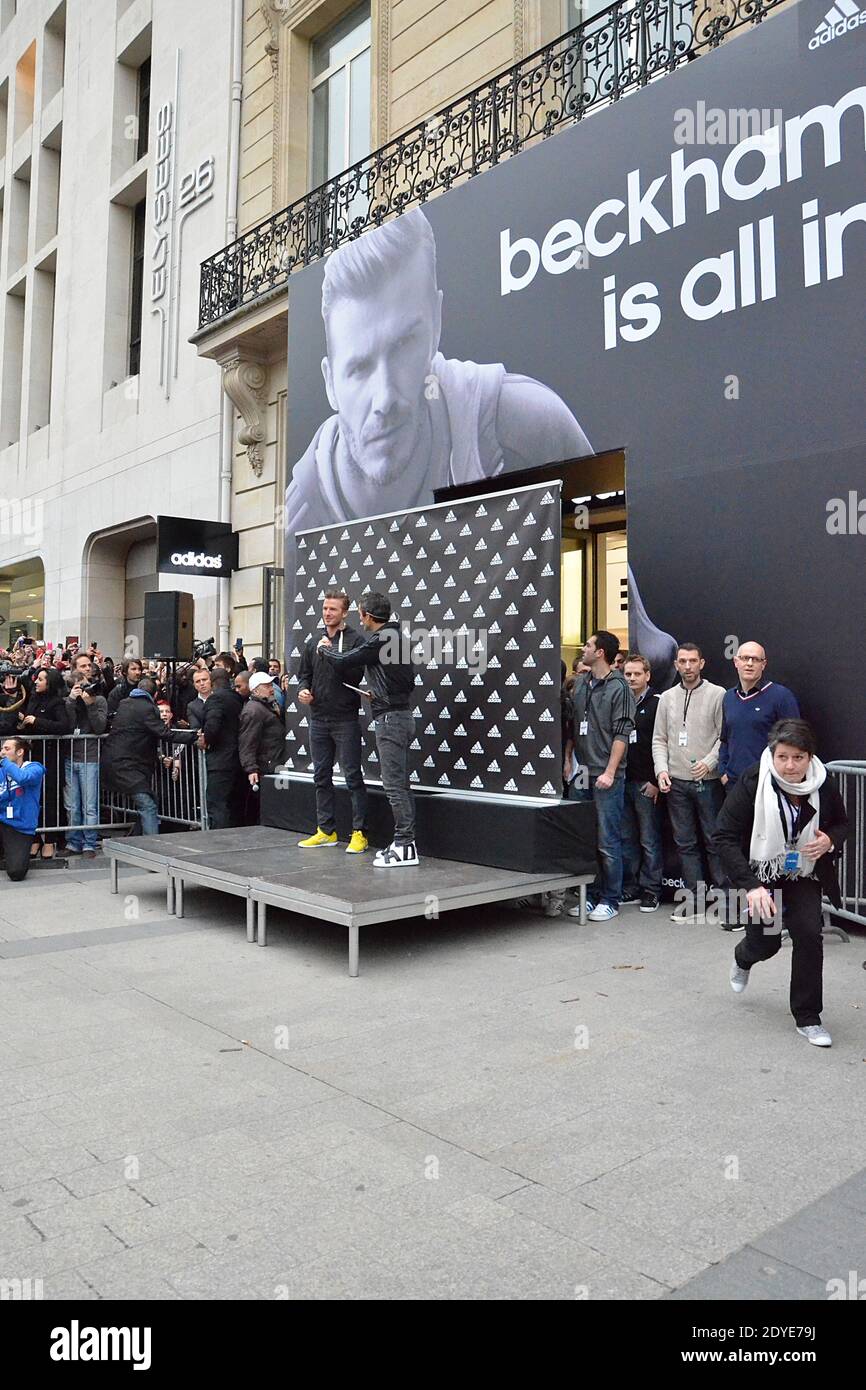 PSG's David Beckham signs autographs for his fans and supporters at Adidas  store, Champs Elysees Avenue in Paris, France on February 28, 2013. Photo  by Thierry Plessis/ABACAPRESS.COM Stock Photo - Alamy