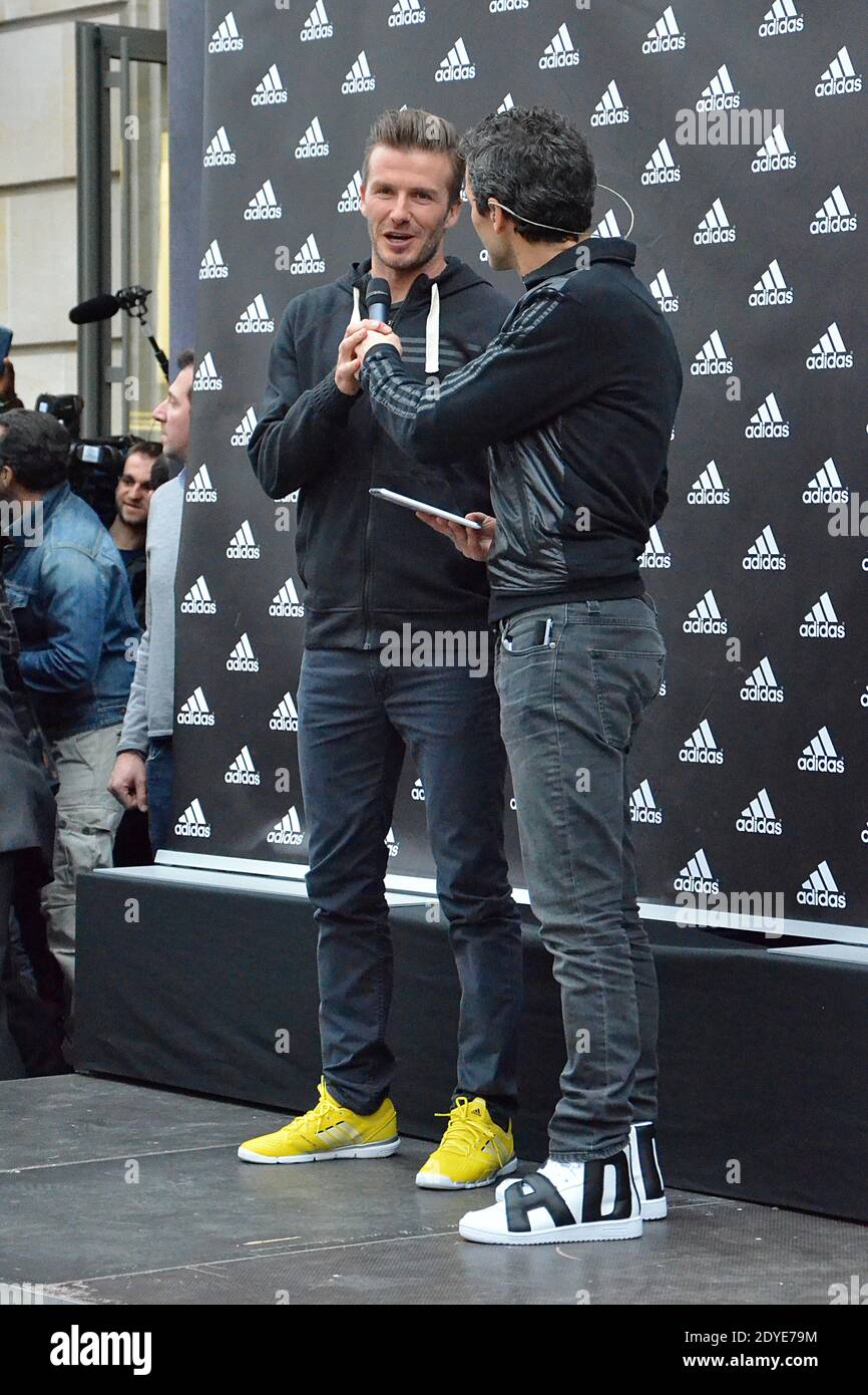 PSG's David Beckham signs autographs for his fans and supporters at Adidas  store, Champs Elysees Avenue in Paris, France on February 28, 2013. Photo  by Thierry Plessis/ABACAPRESS.COM Stock Photo - Alamy
