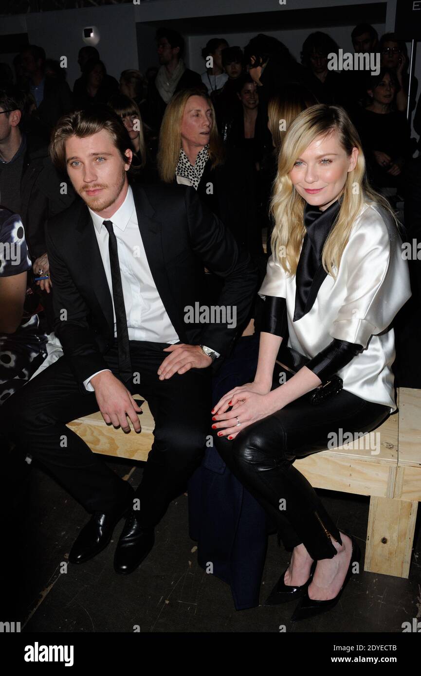 Kirsten Dunst and boyfriend Garrett Hedlund attending Saint Laurent's