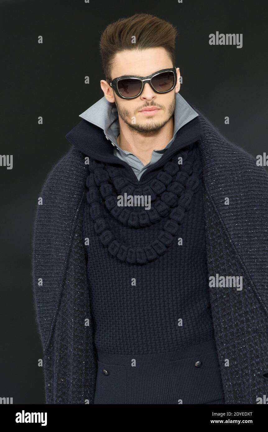 Baptiste Giabiconi displays a creation designed by Karl Lagerfeld