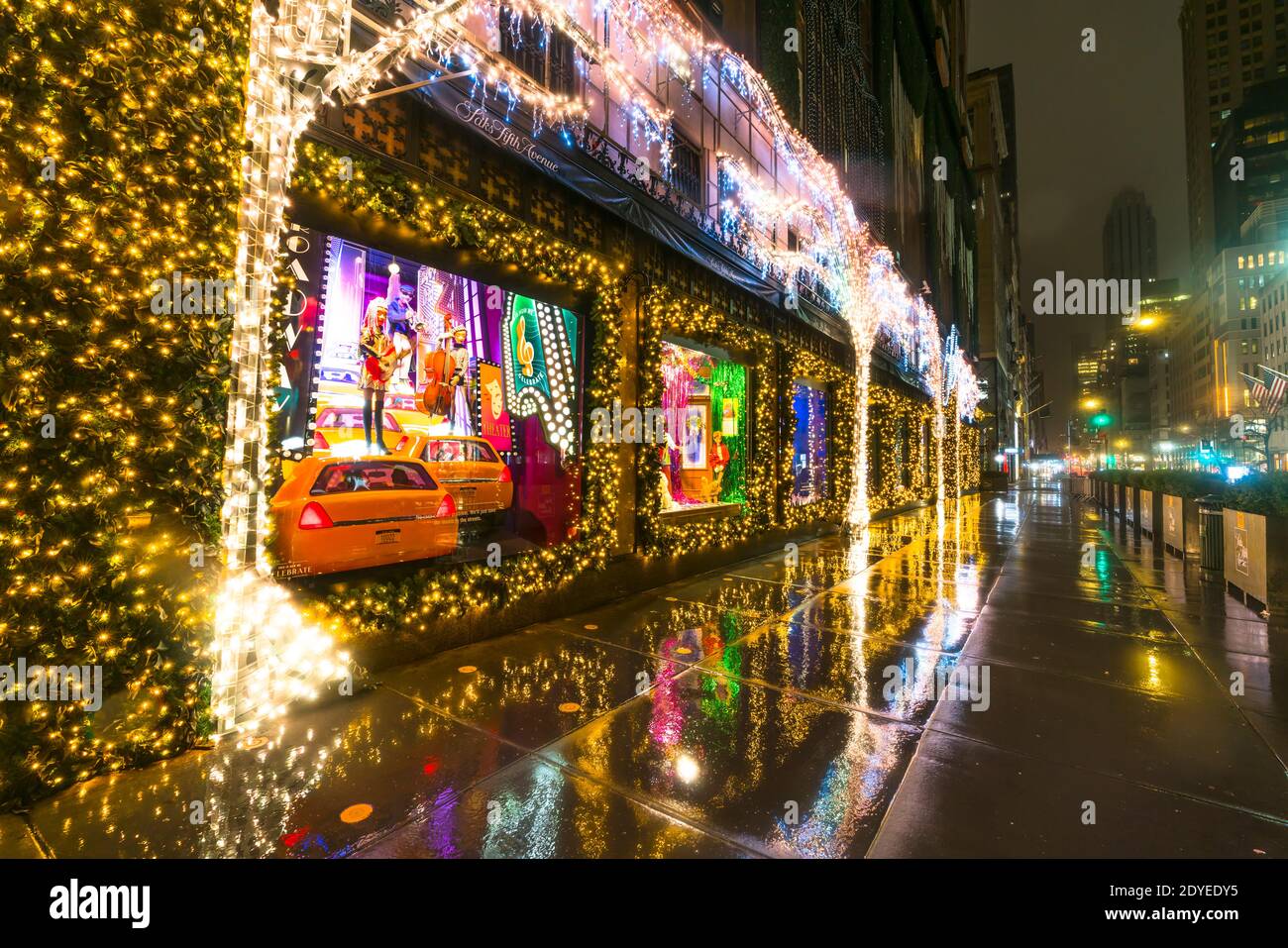 Saks Fifth Avenue Christmas window displays glow in the dawn on