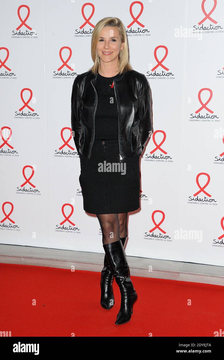 Laurence Ferrari posing at a photocall for the launch of the 2013
