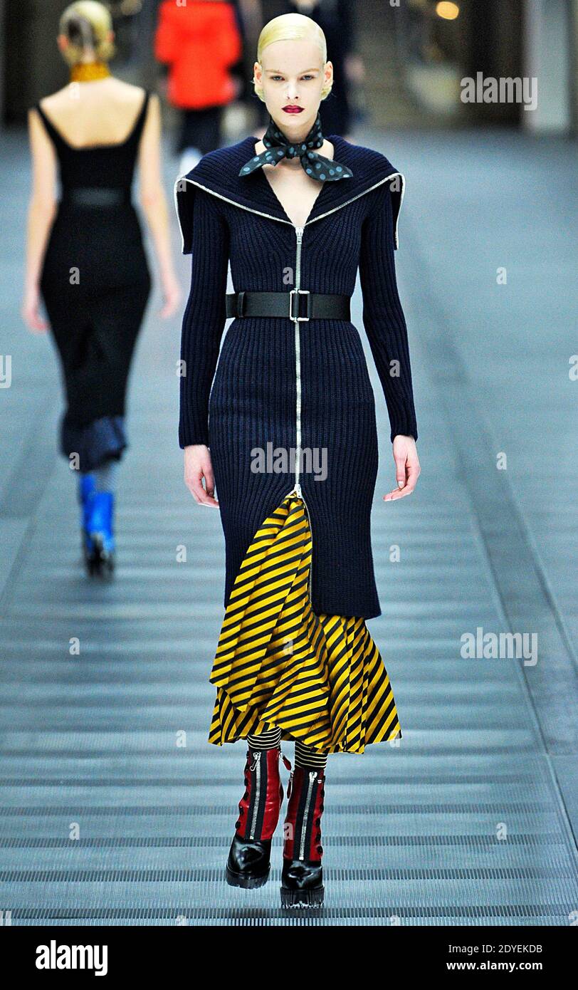 A model displays a creation by Italian designer Miuccia Prada for Miu Miu  Fall-Winter 2013-2014 Ready-To-Wear collection show in Paris, France, on  March 6, 2013. Photo by Alain Gil-Gonzalez/ABACAPRESS.COM Stock Photo -