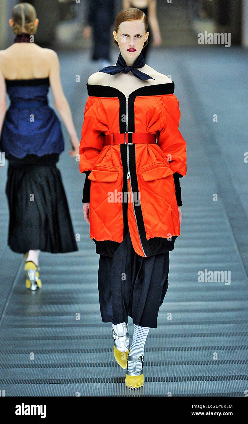 A model displays a creation by Italian designer Miuccia Prada for Miu Miu  Fall-Winter 2013-2014 Ready-To-Wear collection show in Paris, France, on  March 6, 2013. Photo by Alain Gil-Gonzalez/ABACAPRESS.COM Stock Photo -
