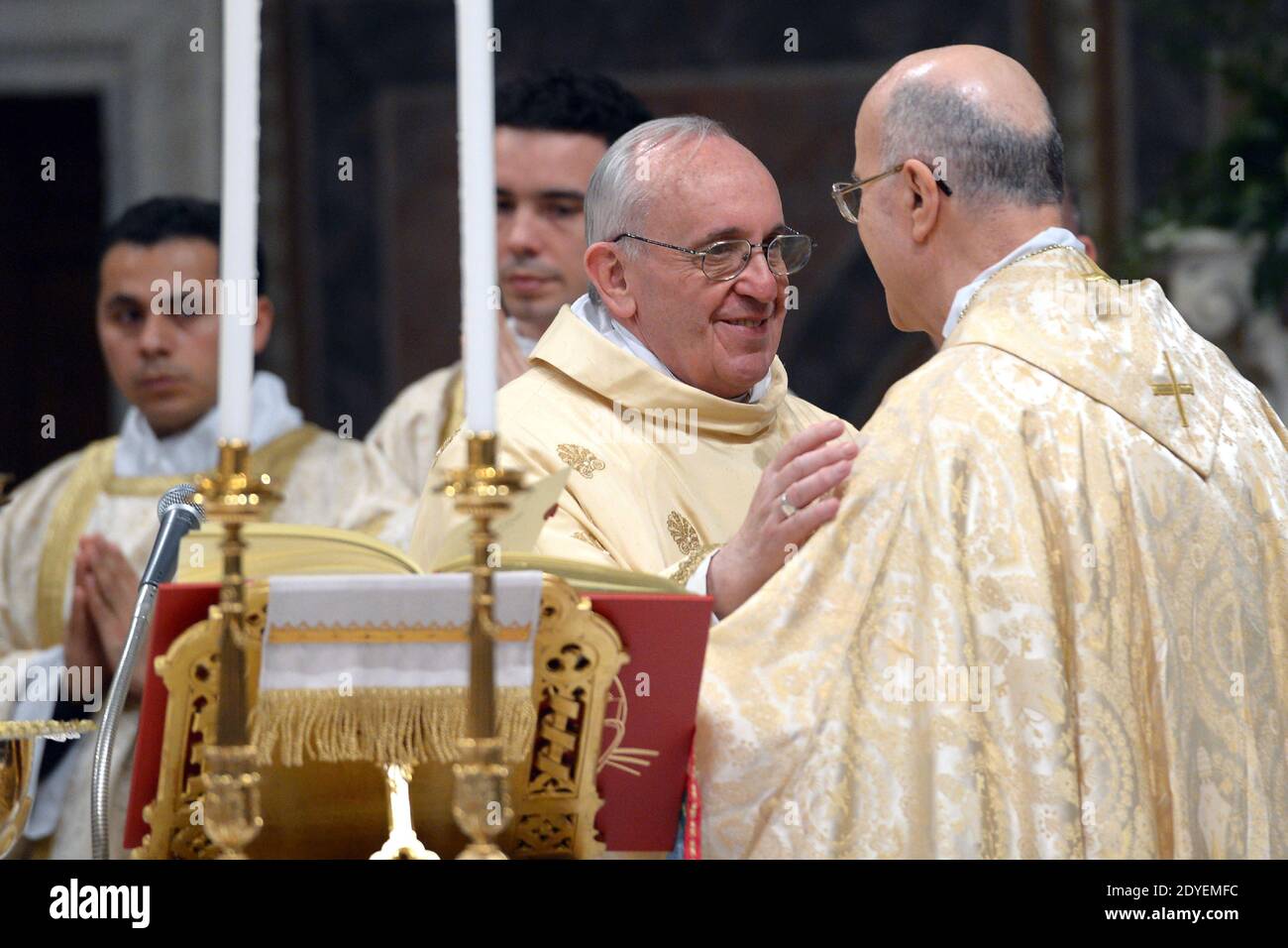 Pope Francis, the newly elected leader of the Catholic Church, took part in his first mass, inside the Sistine Chapel at the Vatican on March 14, 2013. At right : cardinal Tarcisio Bertone. Photo by ABACAPRESS.COM Stock Photo