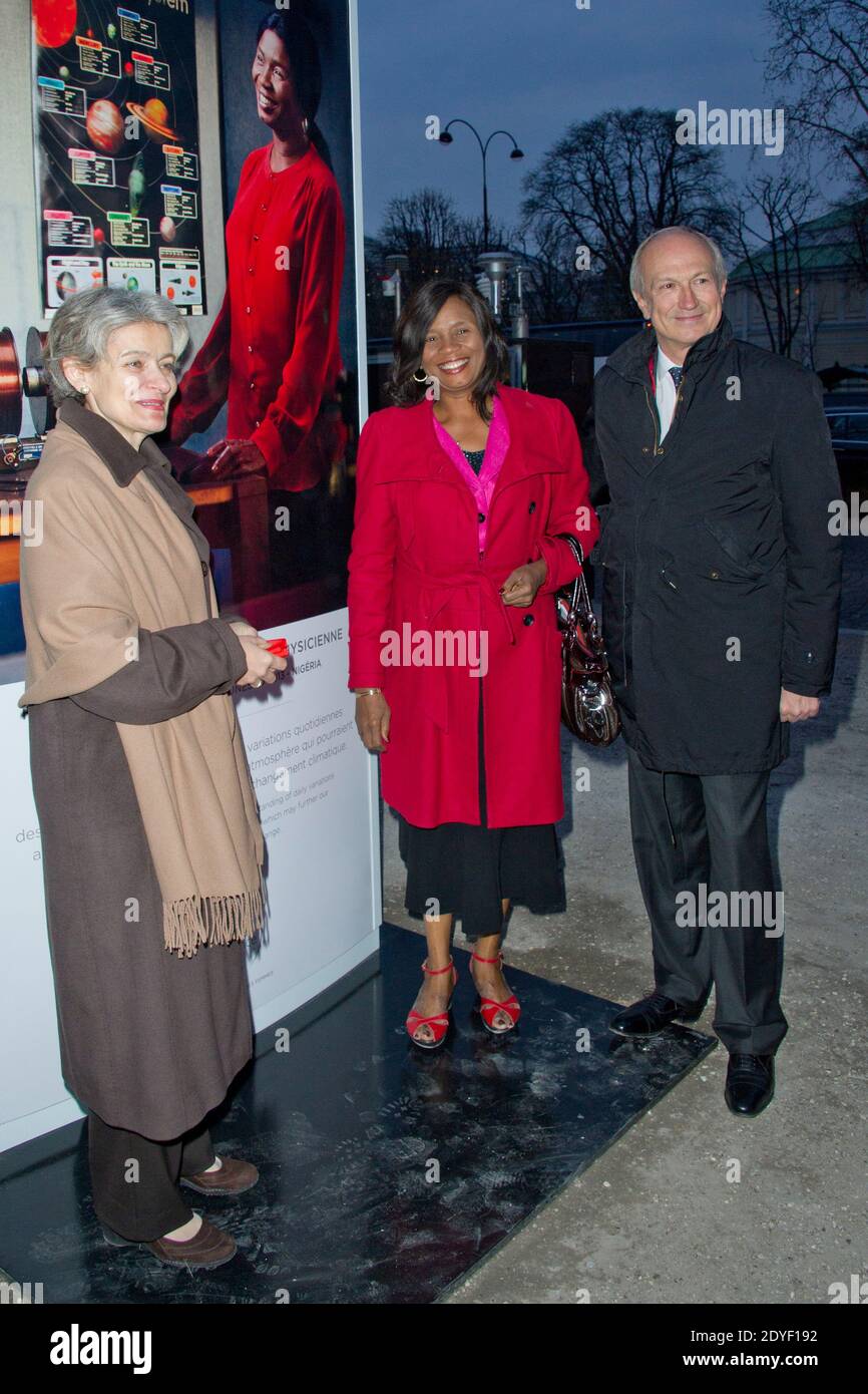 Irina Bokova, General Director of UNESCO, Francisca Nneka Okeke and Jean-Paul Agon, President and General Director of L'Oréal and Président of the L'Oréal Foundation attending the unveilling of the 'L'Oreal-Unesco Awards for women in Science' photo exhibition at Avenue des Champs-Elysees on March 27, 2013 in Paris, France. Photo by Aurore Marechal/ABACAPRESS.COM Stock Photo