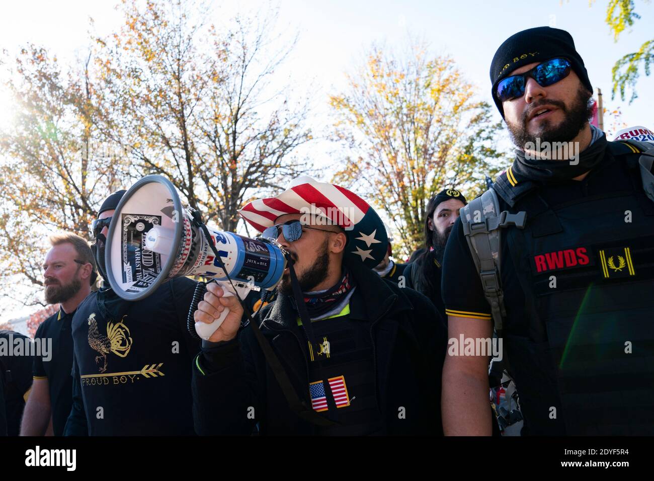 Members of the proud boys are seen at a gathering during the 'Million MAGA March' at Freedom Plaza in Washington, D.C., U.S., on Saturday, Nov. 14, 2020. The rally comes one week after news organizations projected Joe Biden as the winner of the 2020 election and President Trumps refusal to acknowledge he lost. Credit: Alex Edelman/The Photo Access Stock Photo