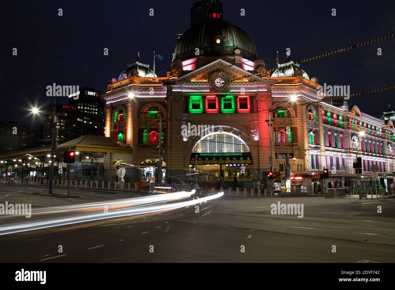 Flinders street building with Christmas lights & light motion of traffic Stock Photo