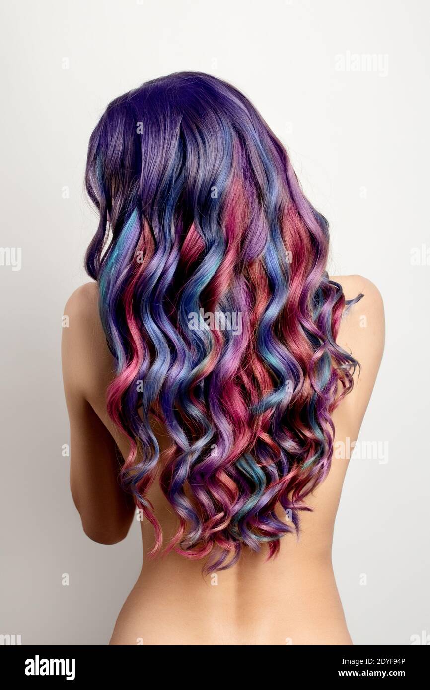 woman with thick wavy hair and a variety of shades of color palette.  Coloring in different colors. Ombre Stock Photo - Alamy