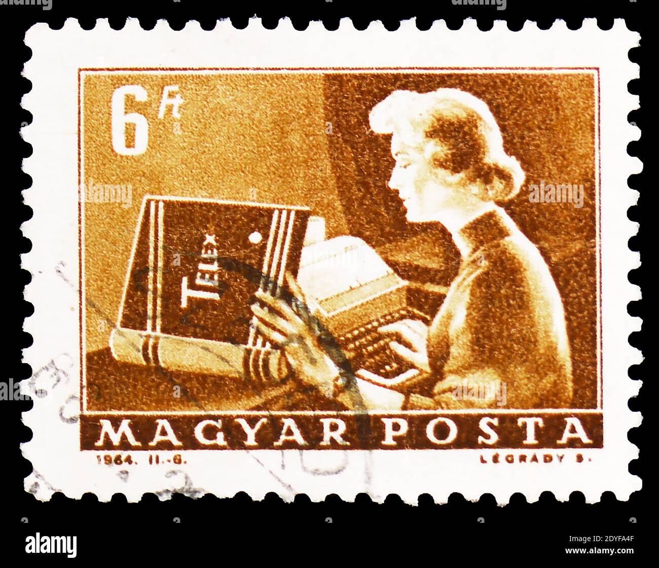MOSCOW, RUSSIA - FEBRUARY 22, 2019: A stamp printed in Hungary shows Telex operator, Transport and Telecommunication serie, circa 1964 Stock Photo