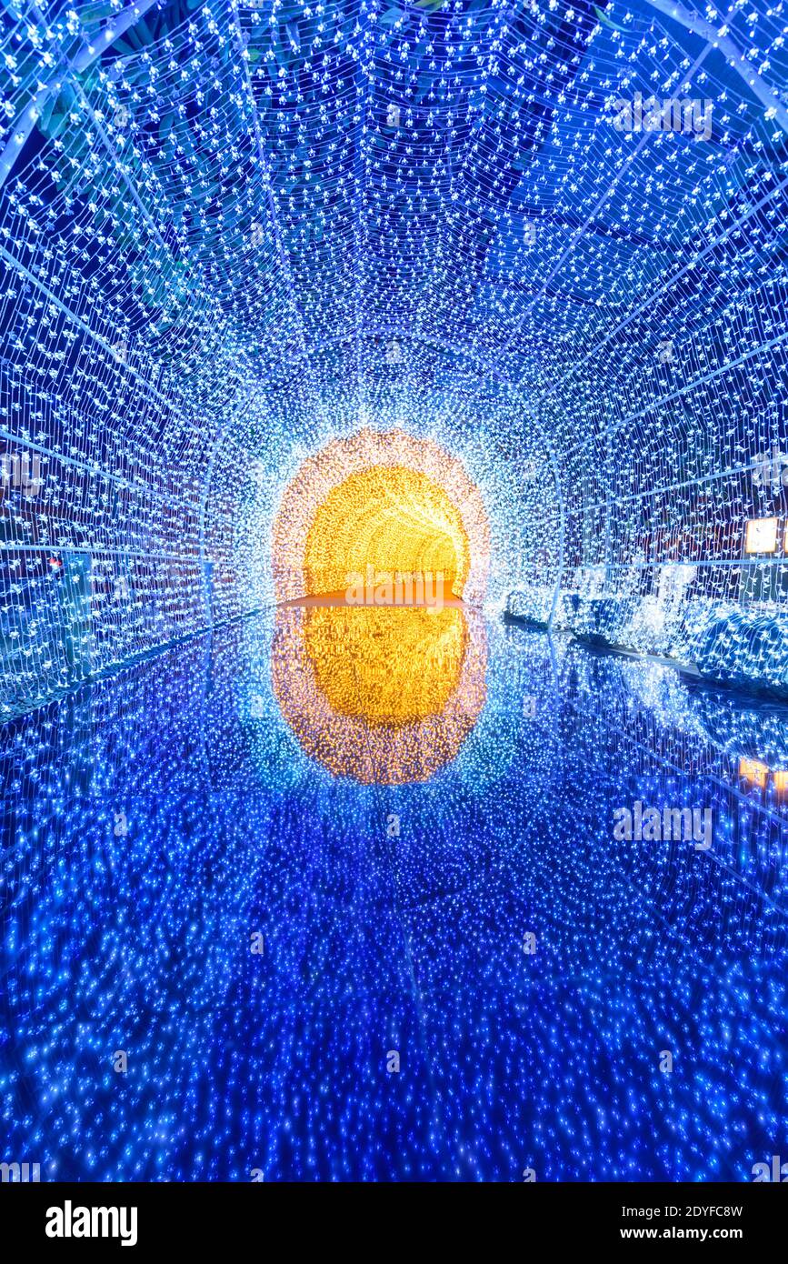 blue lighting tunnel with reflection on ground Stock Photo