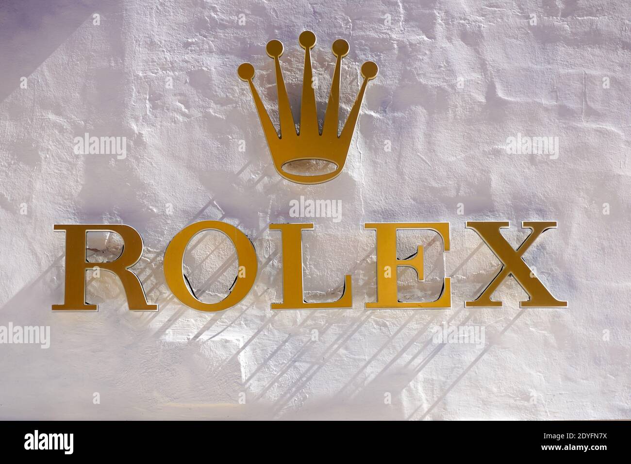 ROME, ITALY - DECEMBER 10, 2020 : Rolex logo on street. Rolex is a manufacturer of high-quality, luxury wristwatches. Trademark was registered in 1908 Stock Photo