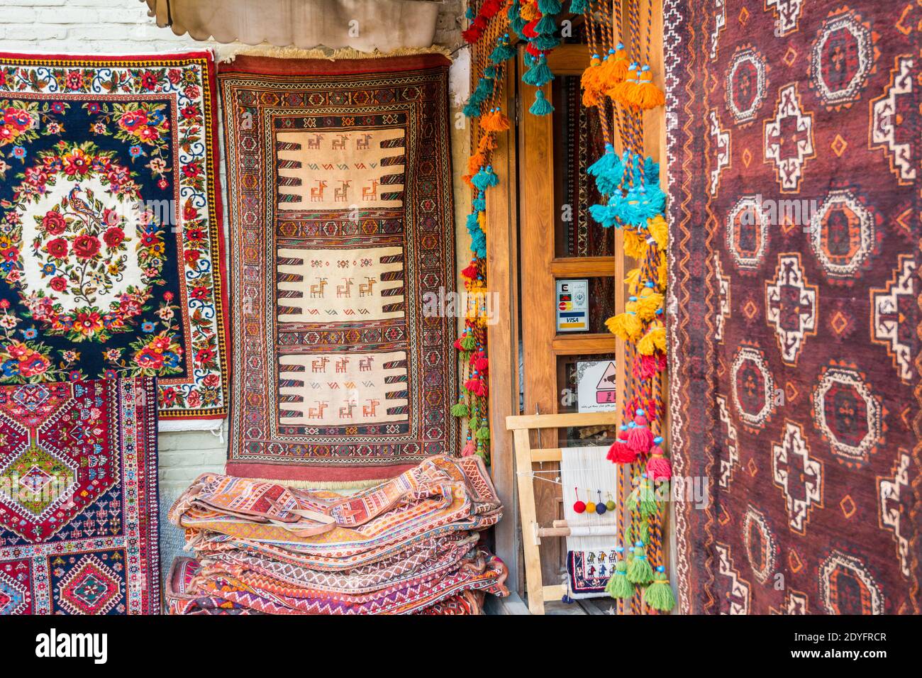 Persian carpet shops in the historic buildings, situated on the west side  of Naqsh-e Jahan Square, one of UNESCO's World Heritage Sites Stock Photo -  Alamy