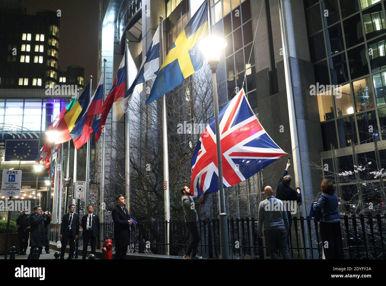 File photo dated 31/01/20 of The Union flag being taken down outside the European Parliament in Brussels, Belgium, ahead of the UK leaving the European Union. The UK and EU have reached a post-Brexit trade agreement. Stock Photo