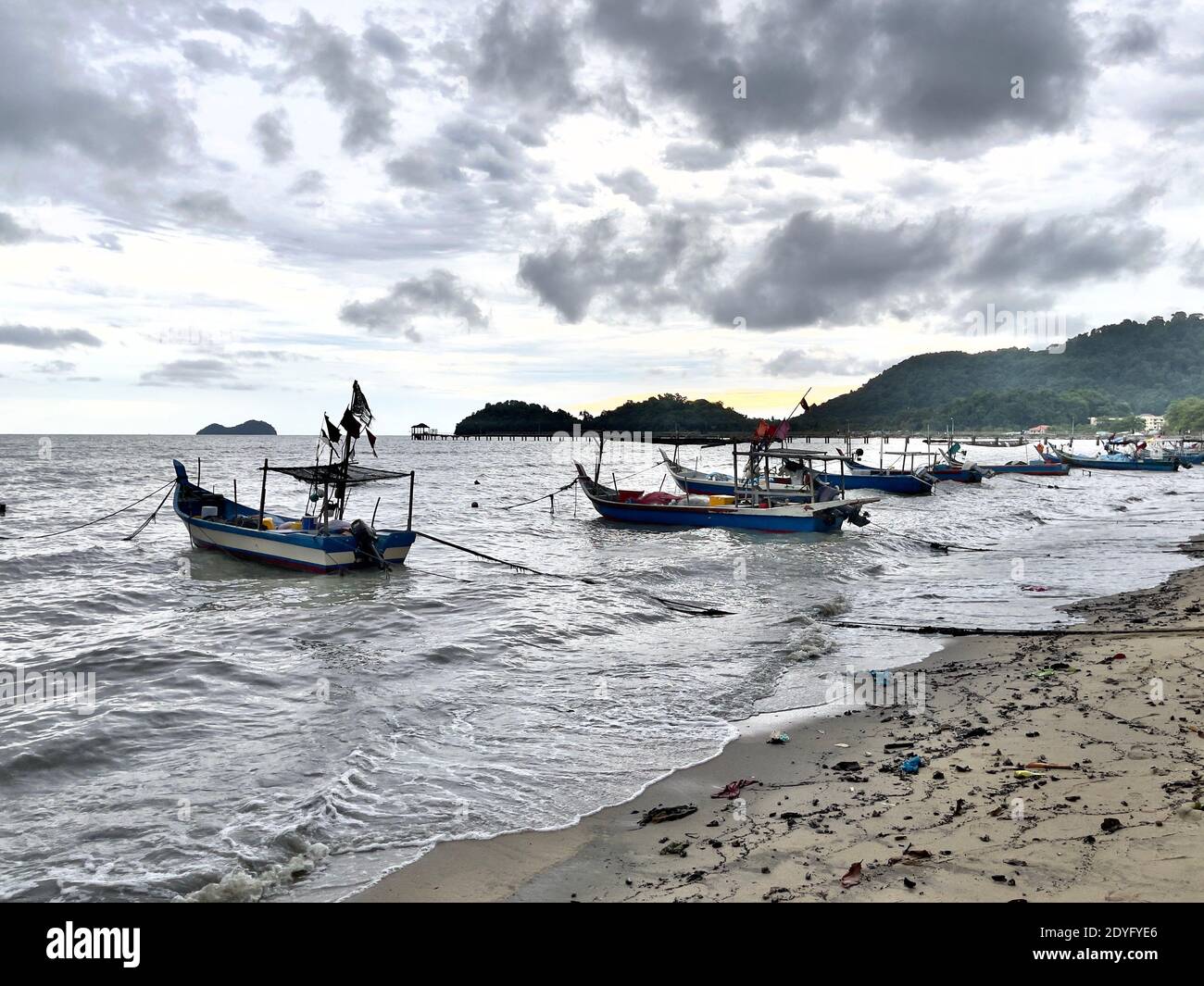 Fishing boat near a fishing village in the Teluk Kumbar Beach, Penang