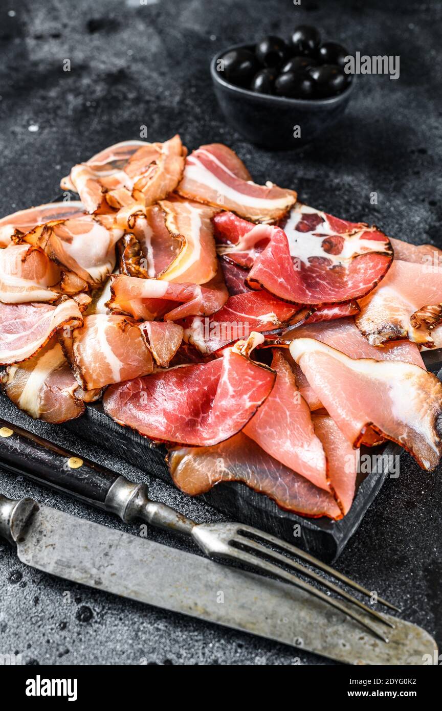 Meat antipasto platter, pancetta, salami, sliced ham, sausage