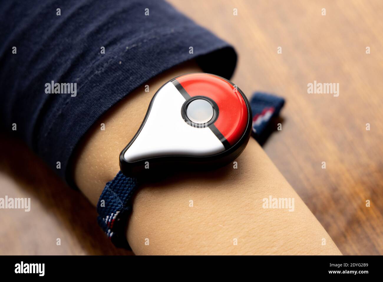 Childs Hand With New Japanese Game Pokemon Go Plus Made By The Pokemon Company Nintendo Addictive Popular Activity Among Children And Grownups Stock Photo Alamy