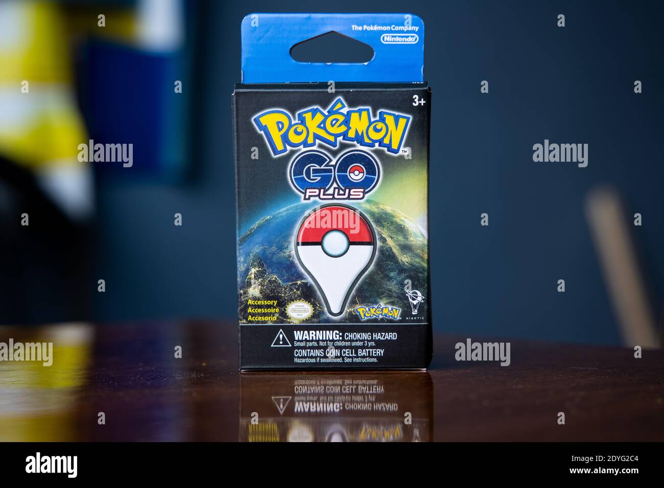New Japanese game Pokemon go plus made by The Pokemon company Nintendo. Addictive popular activity among children and grownups. Stock Photo