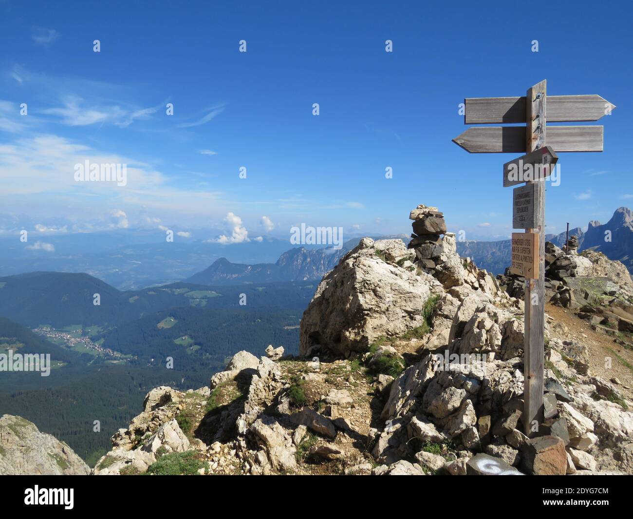 A closeup of road signs in mountains on the scenic mountainscape background,  hiking Dolomite Alps Stock Photo